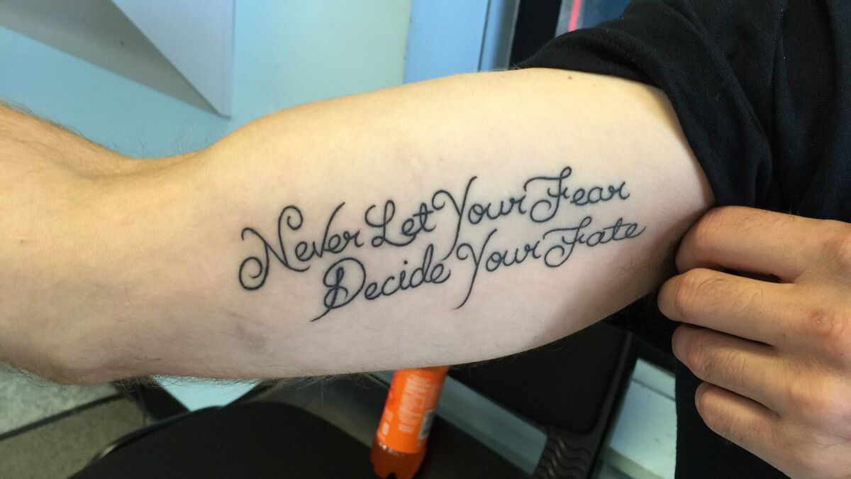 Una frase tatuata sul braccio